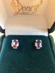 Black pearl oval shaped earrings