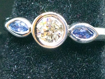 Center Bezel Round Diamond with blue Marquise sapphire bezels on sides 2