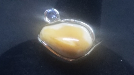 Elk Tooth ring with blue MT Sapphire