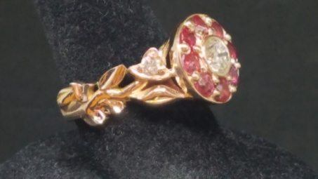 repurposed rubies from a vintage piece, yellow gold with vines and diamonds on sides 1