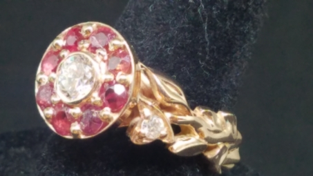 repurposed rubies from a vintage piece, yellow gold with vines and diamonds on sides 3